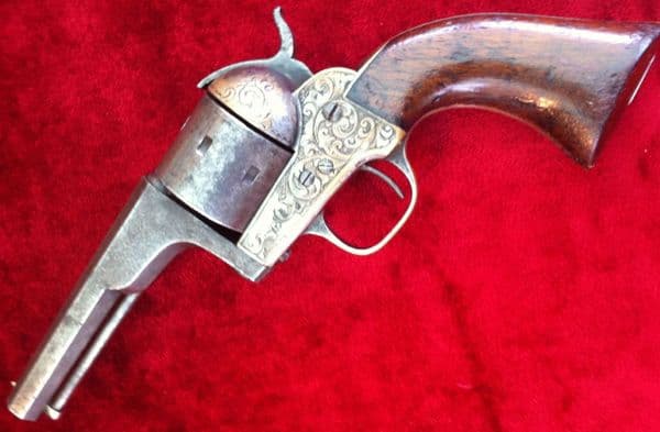 X X X  SOLD X X X A scarce American 7 shot Moore's Patent .32 cal Rimfire revolver made during the era of the Civil War. Circa 1861-1865. Ref 6776.